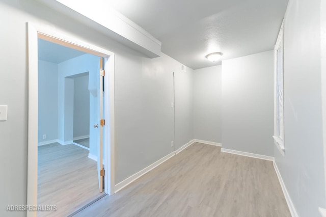 basement with light wood-type flooring