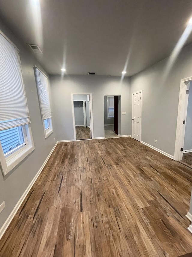 empty room featuring wood-type flooring