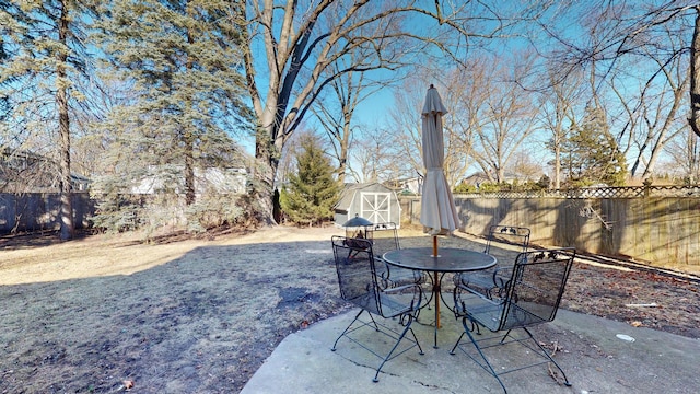 view of patio / terrace with a storage unit