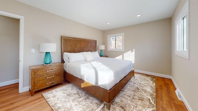 bedroom featuring light wood-type flooring