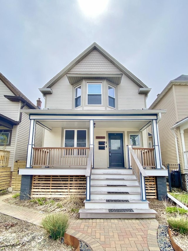 view of front of property featuring covered porch