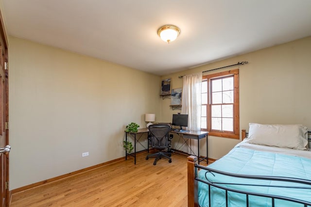 bedroom with light hardwood / wood-style flooring