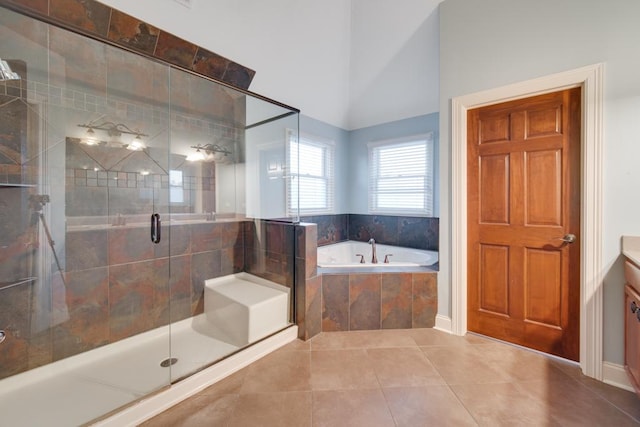 bathroom with vanity, separate shower and tub, and tile patterned flooring