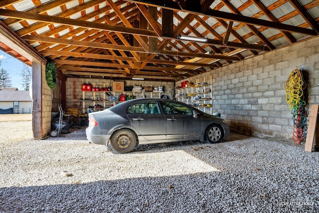 garage featuring concrete block wall