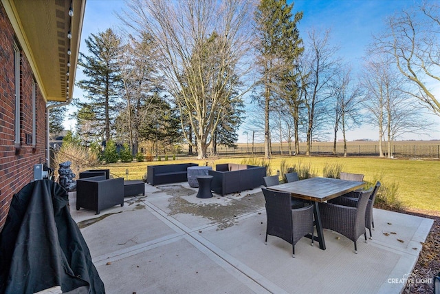 view of patio / terrace featuring outdoor dining space, a fenced backyard, and an outdoor living space