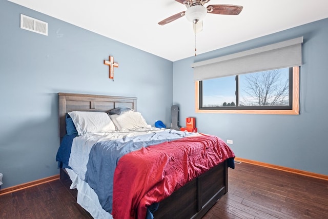 bedroom featuring dark wood-type flooring and ceiling fan