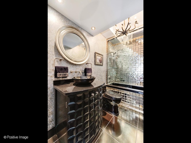 bathroom with vanity, tile patterned floors, and toilet