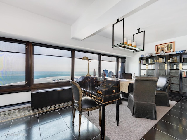 dining area with a water view