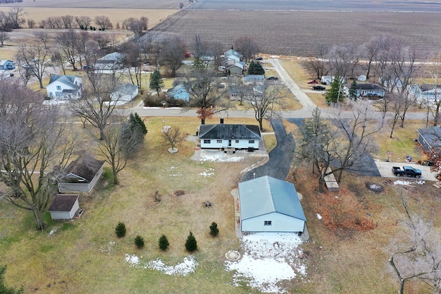 birds eye view of property featuring a rural view