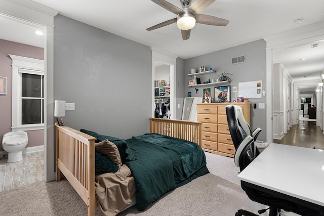 326 E Central Rd, Arlington Heights, IL 60005 - carpeted bedroom featuring connected bathroom, a closet, and ceiling fan