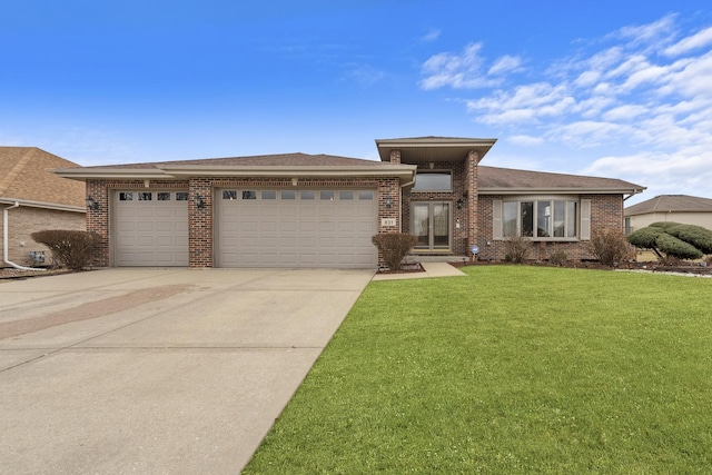 prairie-style house with a garage and a front yard