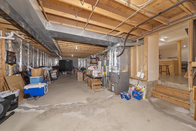 basement featuring heating unit