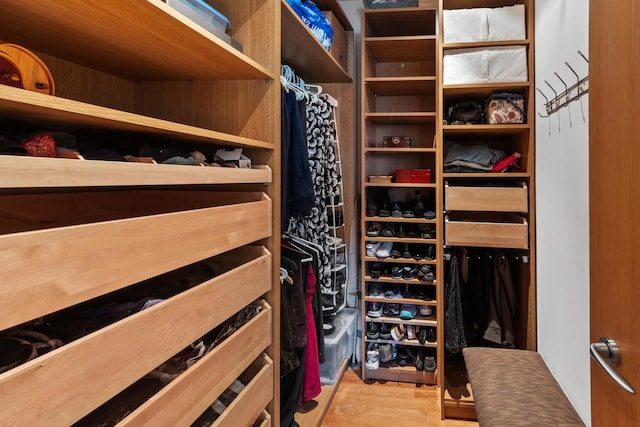 spacious closet featuring light wood-type flooring