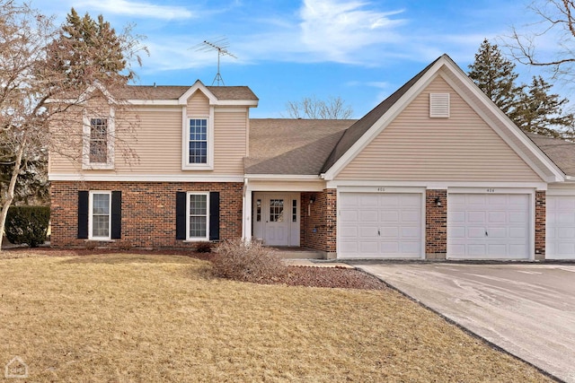 view of front facade featuring a garage and a front lawn