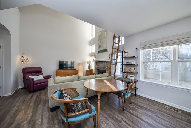 living room featuring dark hardwood / wood-style flooring