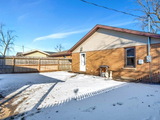 view of snow covered property