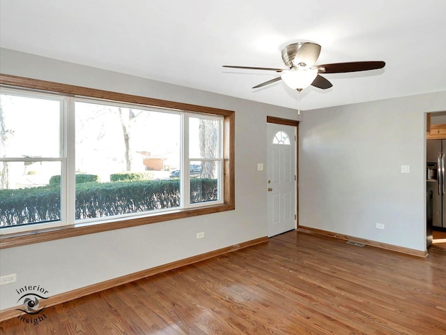 foyer featuring hardwood / wood-style floors and ceiling fan