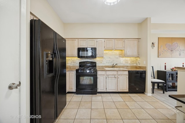 kitchen with sink, backsplash, black appliances, and light tile patterned flooring