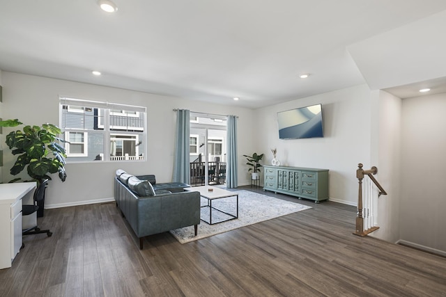 living room featuring dark hardwood / wood-style flooring