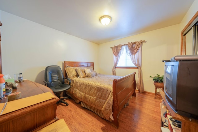 bedroom featuring light hardwood / wood-style floors