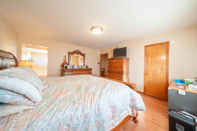 bedroom featuring light wood-type flooring