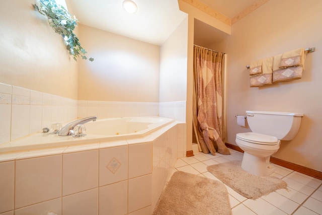 bathroom featuring toilet, tile patterned flooring, and tiled bath