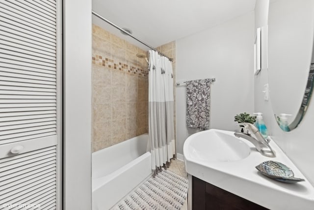 bathroom with shower / tub combo with curtain, vanity, and tile patterned flooring