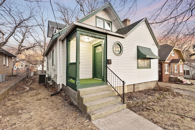 view of front of property with central AC unit