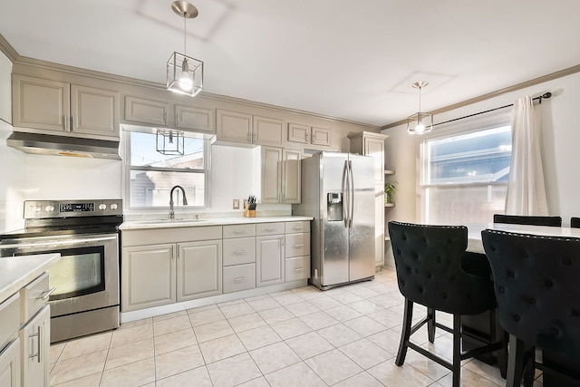 kitchen featuring sink, crown molding, appliances with stainless steel finishes, pendant lighting, and exhaust hood