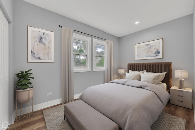 bedroom featuring hardwood / wood-style flooring