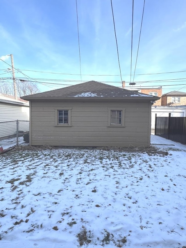 view of snow covered house