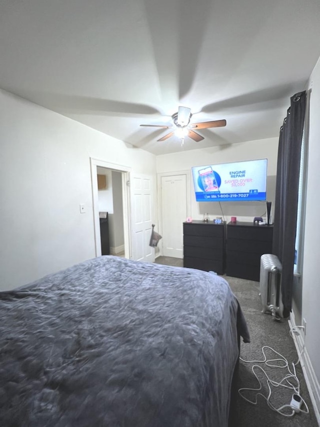 bedroom featuring radiator, ceiling fan, and carpet flooring