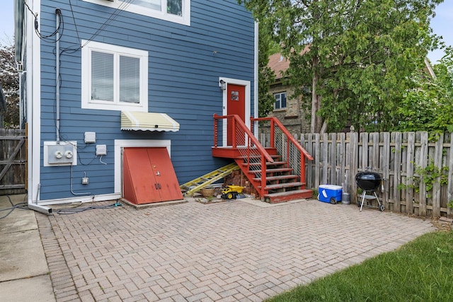 exterior space with a patio area and fence