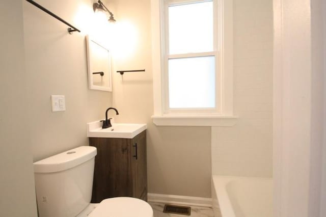 bathroom featuring baseboards, visible vents, toilet, shower / bath combination with curtain, and vanity