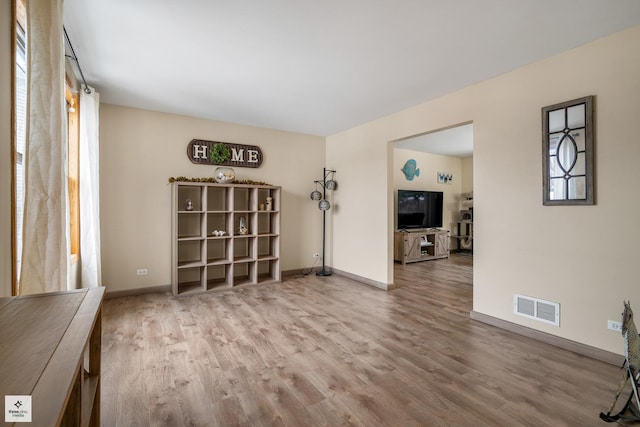 interior space with hardwood / wood-style floors