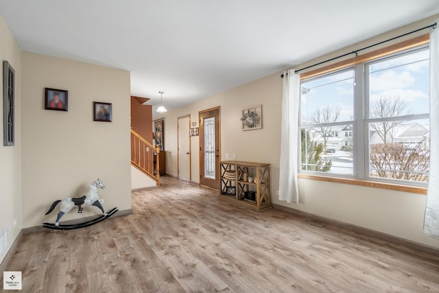 interior space with light hardwood / wood-style flooring