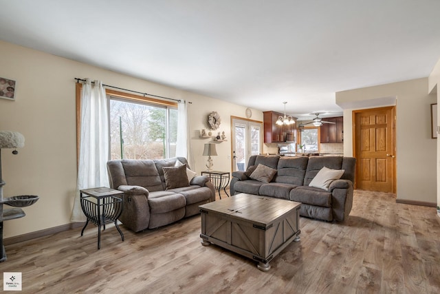 living room with light hardwood / wood-style floors