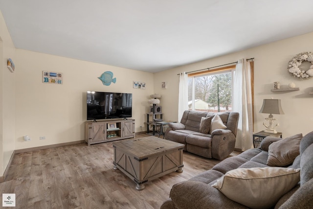 living room with light hardwood / wood-style floors