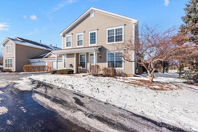 front of property featuring a garage