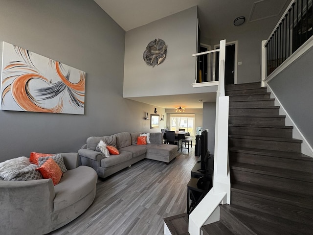 646 Aspen Dr, Romeoville, IL 60446 - living area featuring a high ceiling, stairs, and wood finished floors