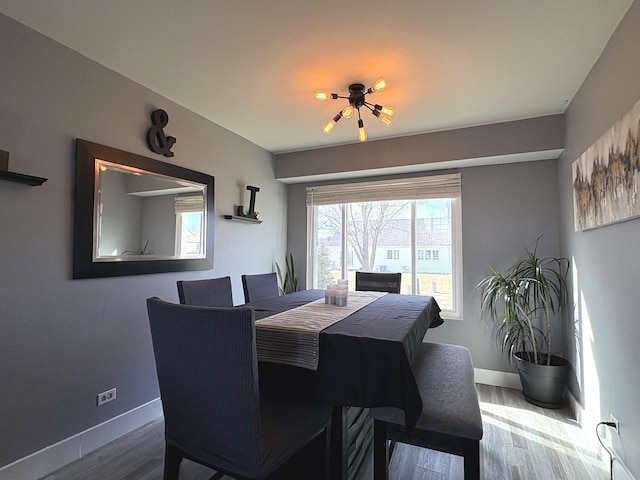 646 Aspen Dr, Romeoville, IL 60446 - dining area with baseboards and wood finished floors