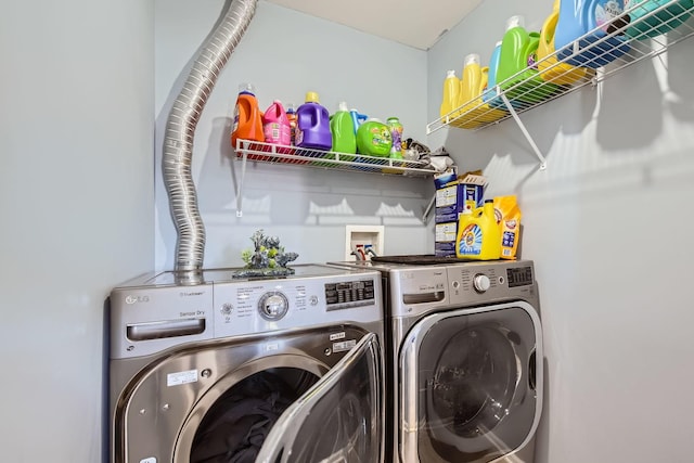 laundry room with independent washer and dryer