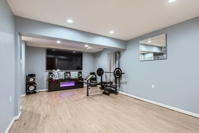 exercise area with hardwood / wood-style floors