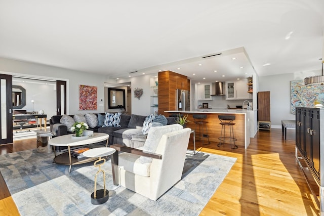 living room with light hardwood / wood-style floors