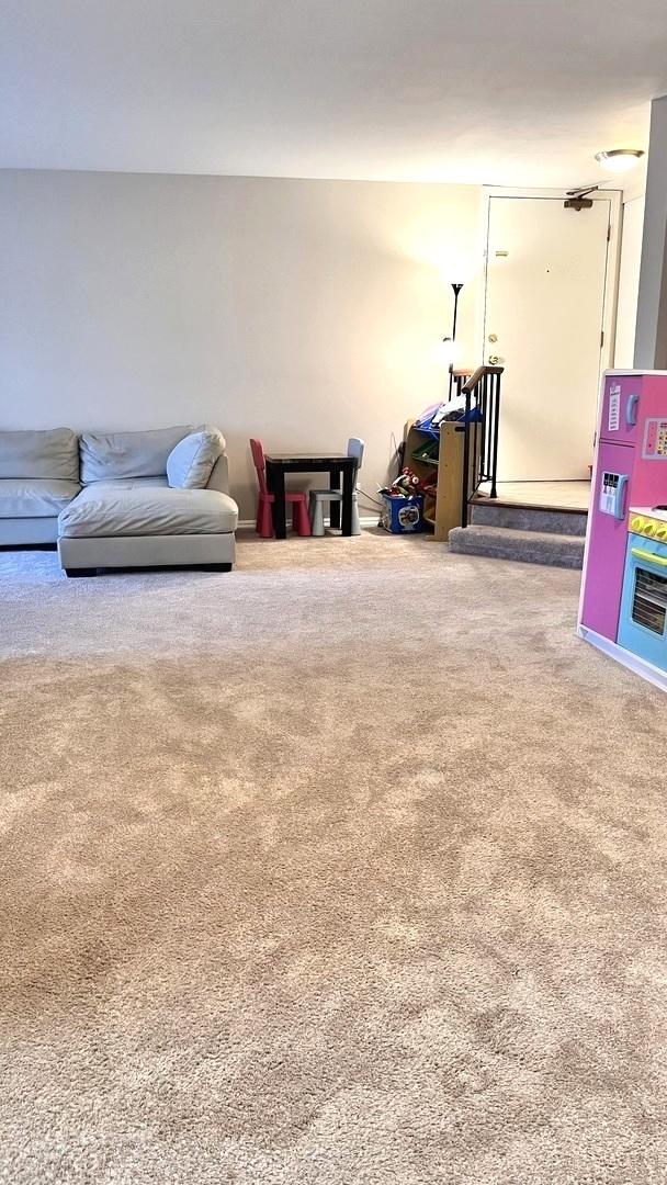 interior space featuring carpet