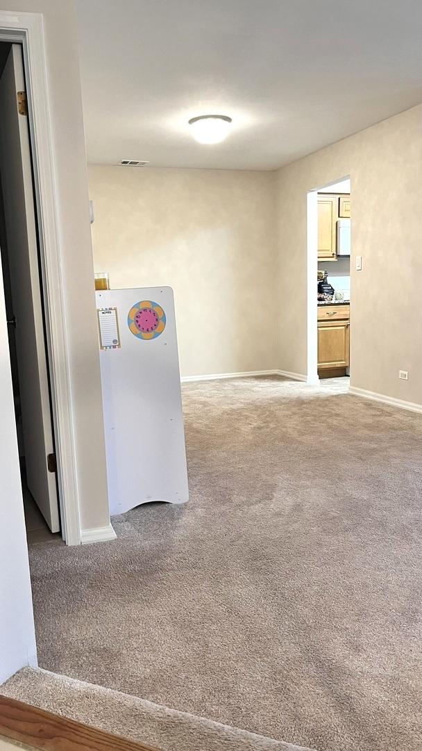 hallway featuring carpet floors