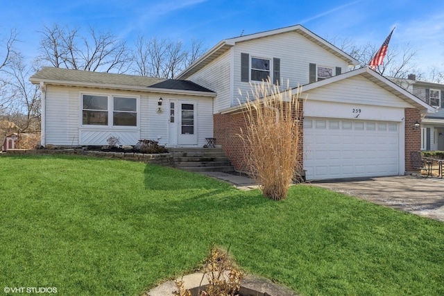 view of front of house with a garage and a front yard