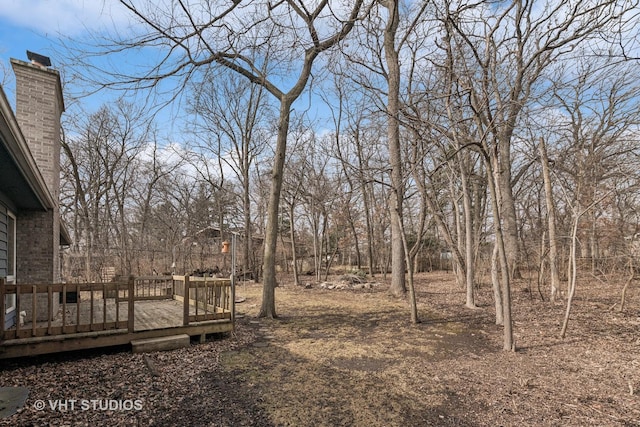 view of yard featuring a deck