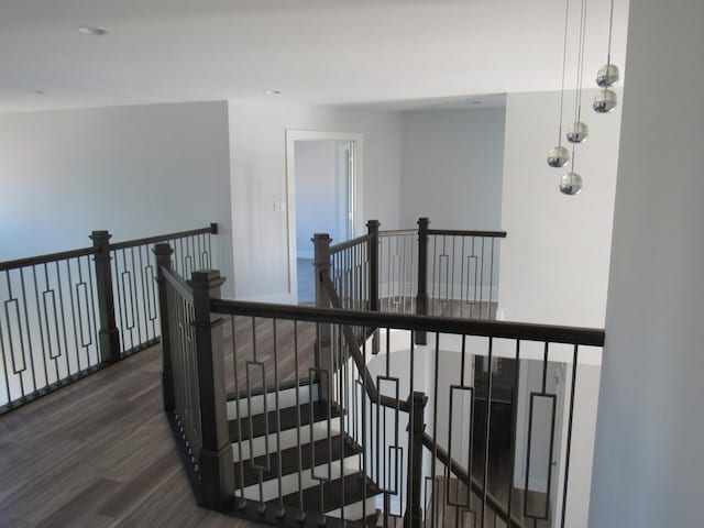 hallway featuring dark hardwood / wood-style floors