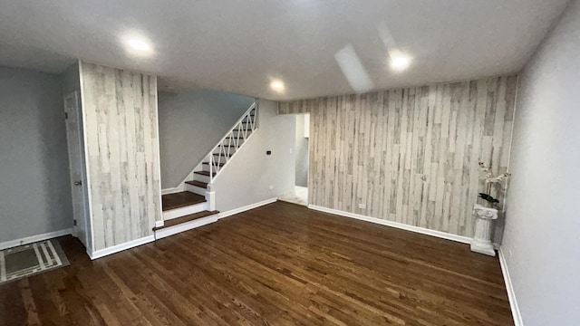 basement with dark wood-type flooring